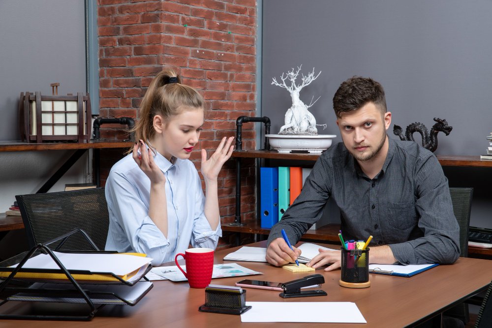 "Small business owner reviewing payroll and inventory features in Xero versus MYOB"